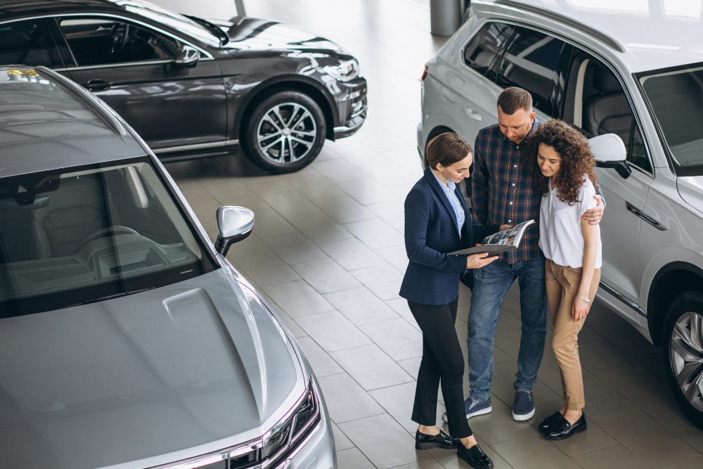 SharePoint Online for Multi-Company Automotive Group Illustration of office team working together to represent workflow automation for Ley Hill Solutions case study